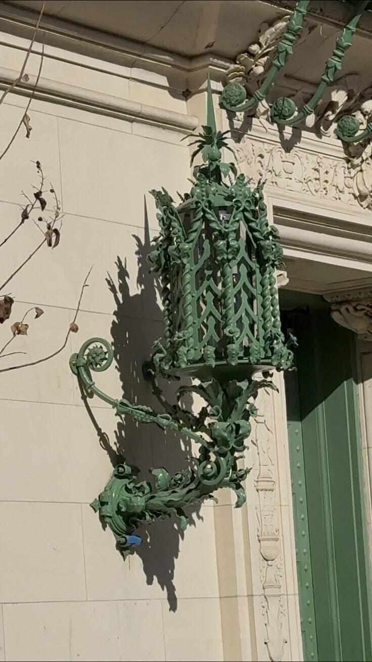 Ornate green iron lantern