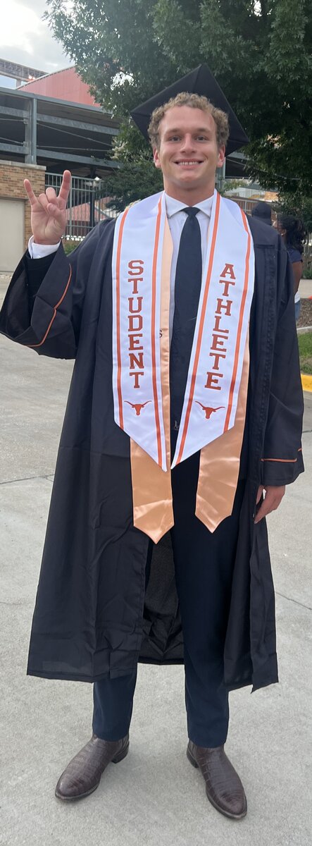 Alec Filipovic at UT Austin graduation in a Student Athlete stole