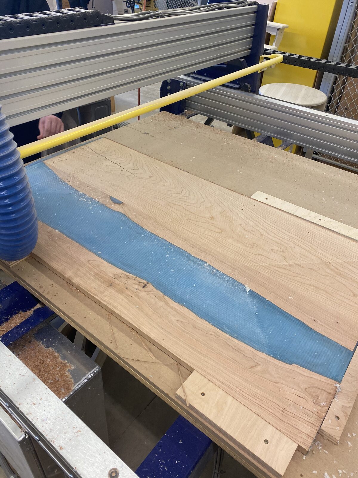Blue epoxy river slab on the CNC